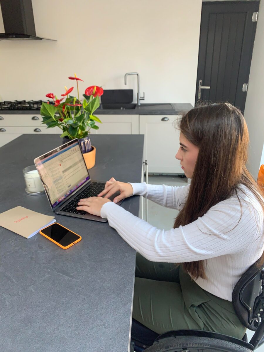 Holly working at her desk