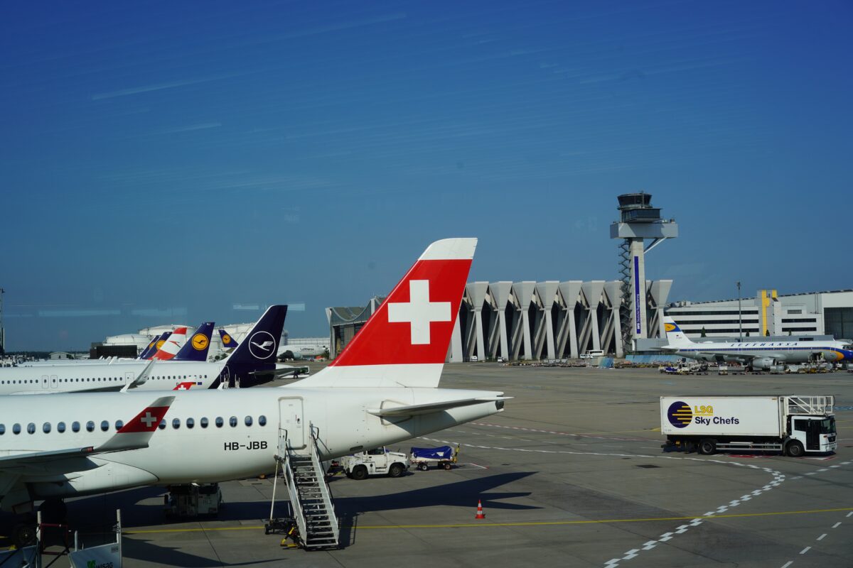 Planes parked on the tarmac at an airport