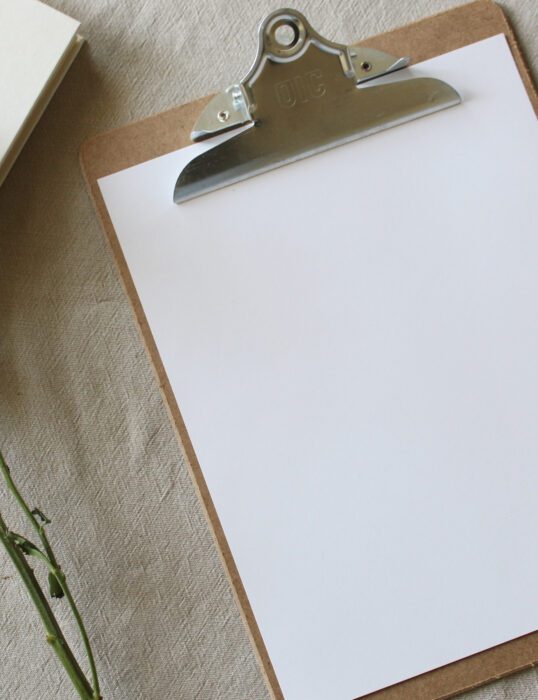 Blank paper on clipboard