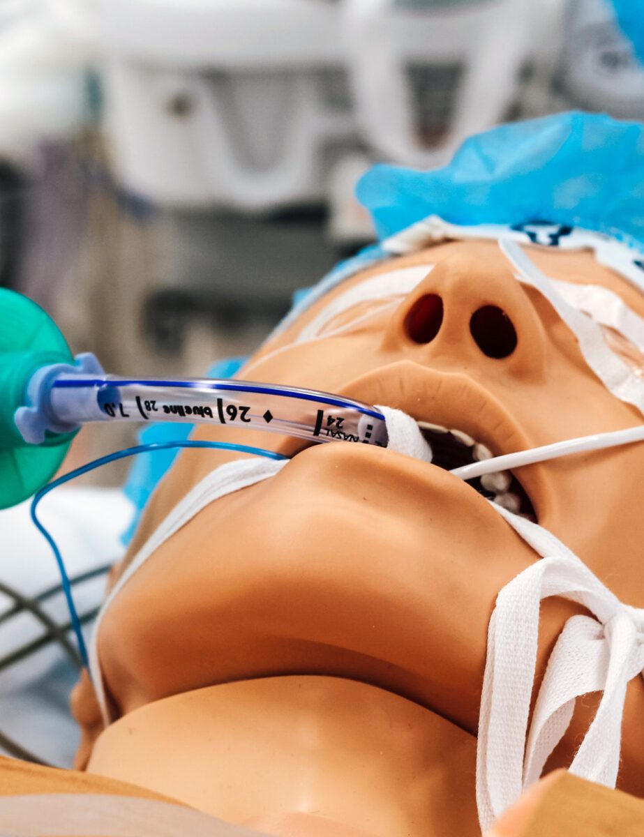 Medical dummy with tubes in its mouth