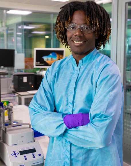 Tolu in lab coat