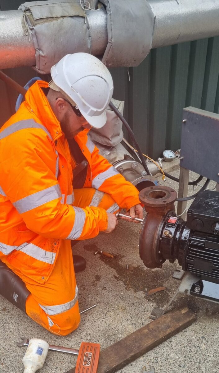 John working at the waste plant